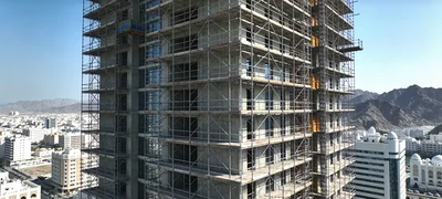 High rise construction scaffolding in Muscat