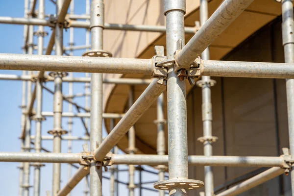 Ringlock scaffolding on building facade in Oman